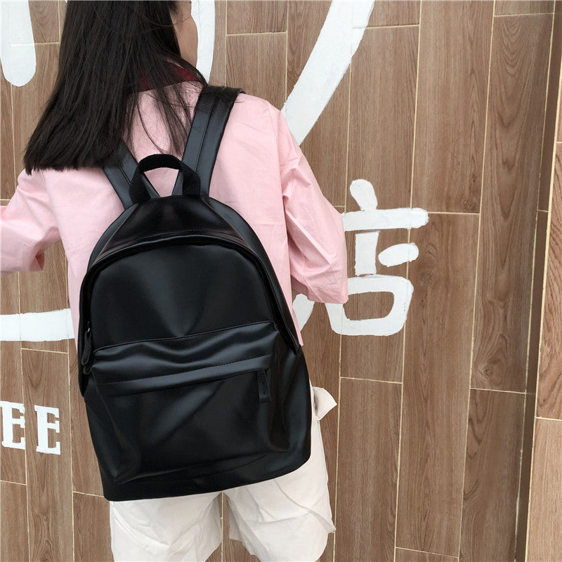 Wholesale Simple Black and White Leather Casual Backpacks